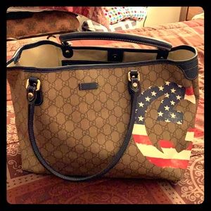 Authentic Gucci shoulder bag with US flag in it.